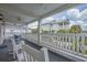 Relax on this porch with rocking chairs and enjoy the beautiful view of the neighborhood at 500 23Rd Ave. S, North Myrtle Beach, SC 29582