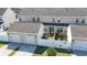 Aerial view of townhomes showing well-maintained backyards, white fences, and easy access to detached garages at 636 Pistoia Ln. # 636, Myrtle Beach, SC 29579