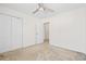 This bedroom contains a ceiling fan and a double door closet to provide adequate space to store belongings at 636 Pistoia Ln. # 636, Myrtle Beach, SC 29579