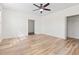 Neutral bedroom with hardwood floors, ceiling fan, closet, and natural light at 636 Pistoia Ln. # 636, Myrtle Beach, SC 29579