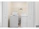 Laundry room with white washer and dryer and access to storage at 636 Pistoia Ln. # 636, Myrtle Beach, SC 29579