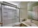 Bathroom features glass shower, white toilet, and sink with large mirror at 638 Hatteras River Rd., Myrtle Beach, SC 29588