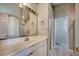 Well-lit bathroom with white vanity, large mirror, and shower with glass door at 638 Hatteras River Rd., Myrtle Beach, SC 29588
