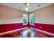 Small bedroom with hardwood floors, and two bright windows at 638 Hatteras River Rd., Myrtle Beach, SC 29588