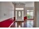 Inviting entryway with hardwood floors, wainscotting, and a decorative glass front door at 638 Hatteras River Rd., Myrtle Beach, SC 29588