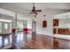 Open living room featuring hardwood floors, arched openings, and a view to the dining area at 638 Hatteras River Rd., Myrtle Beach, SC 29588