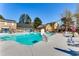 Enjoy this community pool with a slide, lounge chairs, and umbrellas on a sunny day at 638 Hatteras River Rd., Myrtle Beach, SC 29588