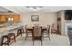 A cozy dining area sits adjacent to the kitchen, perfect for intimate meals and casual gatherings at 6813 Porcher Dr. # 21, Myrtle Beach, SC 29572