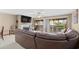 The living room offers a fireplace and sliding glass doors to the balcony for indoor-outdoor living at 6813 Porcher Dr. # 21, Myrtle Beach, SC 29572