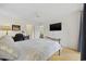Comfortable bedroom with a desk, TV, and a peaceful ambiance at 69 Pinehurst Ln. # 3-F, Pawleys Island, SC 29585