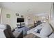 Comfortable living room with a plush sofa, recliner chairs, flat screen TV, and an open layout at 69 Pinehurst Ln. # 3-F, Pawleys Island, SC 29585