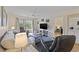 Inviting living room featuring comfortable seating, a ceiling fan, and sliding glass doors to the outside at 69 Pinehurst Ln. # 3-F, Pawleys Island, SC 29585