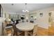 Living and dining area featuring hardwood floors and contemporary decor at 69 Pinehurst Ln. # 3-F, Pawleys Island, SC 29585