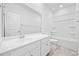 Bright bathroom featuring a double sink vanity and tub with shower combination at 692 Cherry Blossom Dr., Murrells Inlet, SC 29576