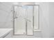 Modern bathroom featuring a spacious shower with glass enclosure and built in seat at 692 Cherry Blossom Dr., Murrells Inlet, SC 29576