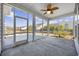 Inviting screened porch offering outdoor living space and neighborhood views at 692 Cherry Blossom Dr., Murrells Inlet, SC 29576