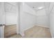 A walk-in closet with carpeted floors and wire shelving for optimal organization at 692 Cherry Blossom Dr., Murrells Inlet, SC 29576