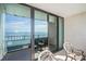 Oceanfront balcony with seating offering panoramic views of the ocean and coastline at 7100 N Ocean Blvd. N # 1011, Myrtle Beach, SC 29572