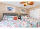 Bedroom with two beds, shell-themed bedding, and beachy decor offers a relaxing coastal retreat at 712A Ocean Blvd. S, Surfside Beach, SC 29575
