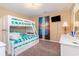 Bedroom features bunk beds and a wall-mounted television at 712A Ocean Blvd. S, Surfside Beach, SC 29575