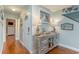 Inviting entryway with wood floors, coastal decor, and a charming console table at 712A Ocean Blvd. S, Surfside Beach, SC 29575