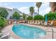 Private backyard pool with plenty of seating and lounge chairs, perfect for relaxing and soaking up the sun at 712A Ocean Blvd. S, Surfside Beach, SC 29575