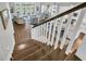 Open-concept living area showcasing hardwood floors, comfortable seating, and large windows for abundant natural light at 7317 Lieth Ln., Sunset Beach, NC 28468