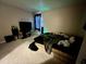 This is a bedroom with neutral walls, carpet flooring, and a comfy bed at 755 Burcale Rd. # G4, Myrtle Beach, SC 29579