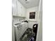 The laundry room features a washer, dryer, and built-in cabinets at 755 Burcale Rd. # G4, Myrtle Beach, SC 29579