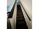A long, zebra-striped carpeted stairway leading up to the second floor at 755 Burcale Rd. # G4, Myrtle Beach, SC 29579