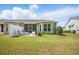 Well-maintained backyard with a patio, seating, and a lush green lawn at 779 Salerno Circle # A, Myrtle Beach, SC 29579