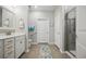 Modern bathroom with a walk-in shower, vanity, and accessible handrails at 779 Salerno Circle # A, Myrtle Beach, SC 29579