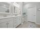 Bathroom featuring double vanities, ample cabinet space, and a walk-in shower at 779 Salerno Circle # A, Myrtle Beach, SC 29579