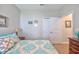 Bedroom featuring light walls, white trim, and an open closet door at 779 Salerno Circle # A, Myrtle Beach, SC 29579