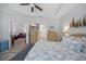 Primary bedroom featuring a TV and a doorway to the living room at 779 Salerno Circle # A, Myrtle Beach, SC 29579