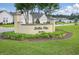 A welcoming community sign with lush landscaping and manicured flower beds at 779 Salerno Circle # A, Myrtle Beach, SC 29579