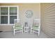 Cozy front porch with comfortable rocking chairs and decorative accents at 779 Salerno Circle # A, Myrtle Beach, SC 29579