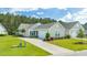 Charming home with a well-manicured lawn, attractive landscaping, and inviting curb appeal at 779 Salerno Circle # A, Myrtle Beach, SC 29579