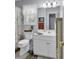 Charming bathroom featuring a floral shower curtain and a bright vanity area at 86 Black River Rd., Myrtle Beach, SC 29588