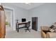 This is a small bedroom/office with a desk and chair at 86 Black River Rd., Myrtle Beach, SC 29588