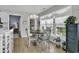 Sun-filled breakfast nook with round table, bright windows, and garden views at 86 Black River Rd., Myrtle Beach, SC 29588