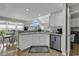 Bright kitchen featuring white cabinets, stainless steel appliances, and a breakfast nook at 86 Black River Rd., Myrtle Beach, SC 29588