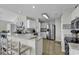 Modern kitchen with stainless steel appliances, breakfast bar, and plenty of cabinet space at 86 Black River Rd., Myrtle Beach, SC 29588