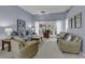 Cozy living room with comfortable seating and French doors leading to the outside at 86 Black River Rd., Myrtle Beach, SC 29588