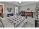 Relaxing main bedroom features tray ceiling and neutral decor at 86 Black River Rd., Myrtle Beach, SC 29588
