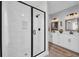 Beautiful bathroom featuring a glass-enclosed shower, double vanity, and modern fixtures at 915 Palmetto St., Georgetown, SC 29440