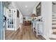 Inviting foyer with light hardwood floors leading to the open living area at 915 Palmetto St., Georgetown, SC 29440
