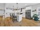 Bright kitchen featuring white cabinetry, a center island, and modern appliances at 915 Palmetto St., Georgetown, SC 29440