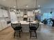 Bright, modern kitchen with a large island, stainless steel appliances, and stylish black accents at 915 Palmetto St., Georgetown, SC 29440
