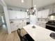 Bright, airy kitchen with white cabinets, quartz countertops and stainless steel appliances at 915 Palmetto St., Georgetown, SC 29440
